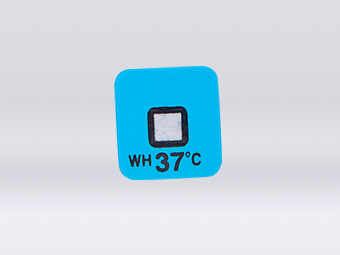 Warm high temperature indicator label